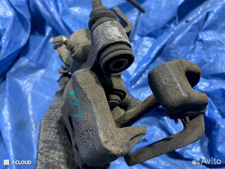 Суппорт на mazda capella gwer