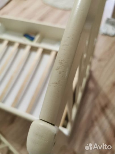 Детская кроватка с маятником и ящиком