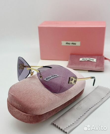 Солнцезащитные очки Miu Miu