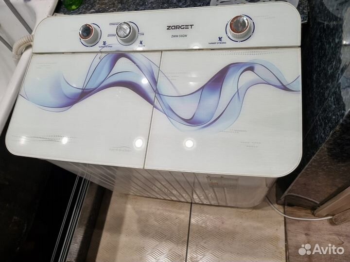 Стиральная машина с вертикальной загрузкой