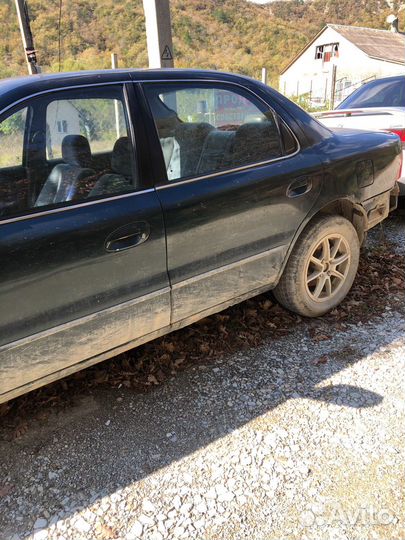 Kia Clarus 2.0 МТ, 2000, битый, 302 852 км