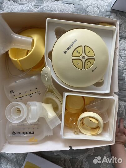 Молокоотсос medela swing электрический + ручной