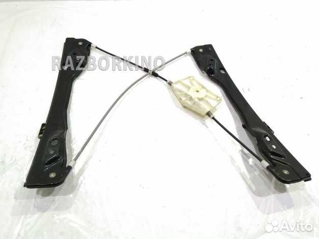 Стеклоподъемник электрический передний левый 7T4Z7