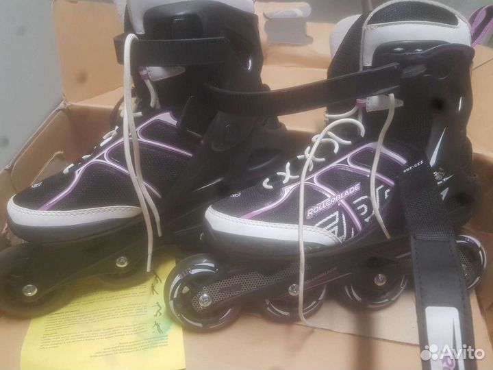 Роликовые коньки