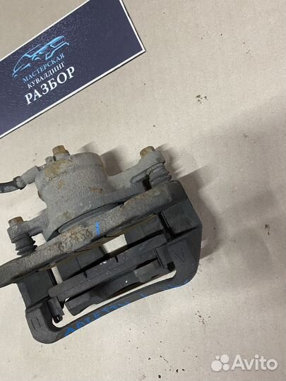 Тормозной суппорт передний левый Chevrolet lacetti