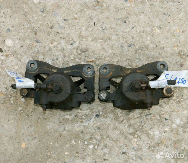 Суппорт передний Nissan Almera N15