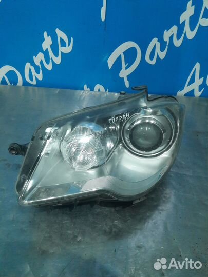 Фольксваген Тауран фара левая
