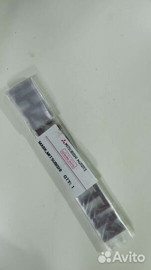 Эмблема Mitsubishi