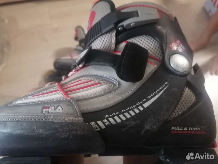 Роликовые коньки