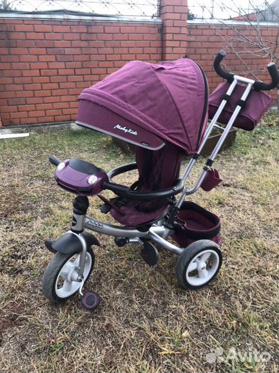 Детский велосипед с ручкой трехколесный Moby Kids