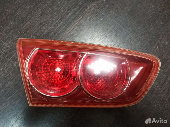 Фонарь задний левый внутренний lancer 10
