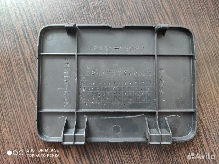 Заглушка обшивки багажника задняя Toyota Corolla