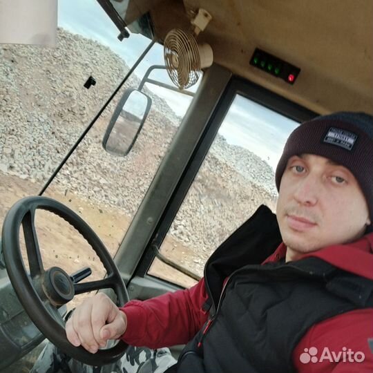 Машинист бульдозера