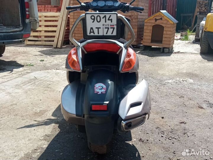 Макси скутер
