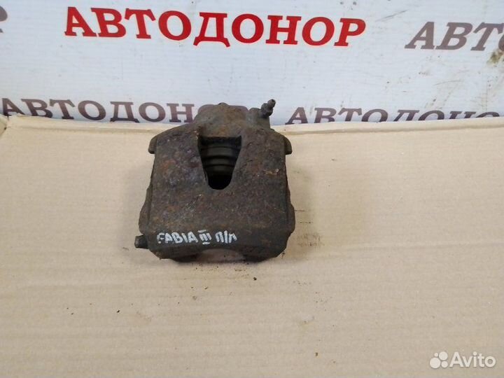 Суппорт тормозной передний левый Skoda Fabia 2