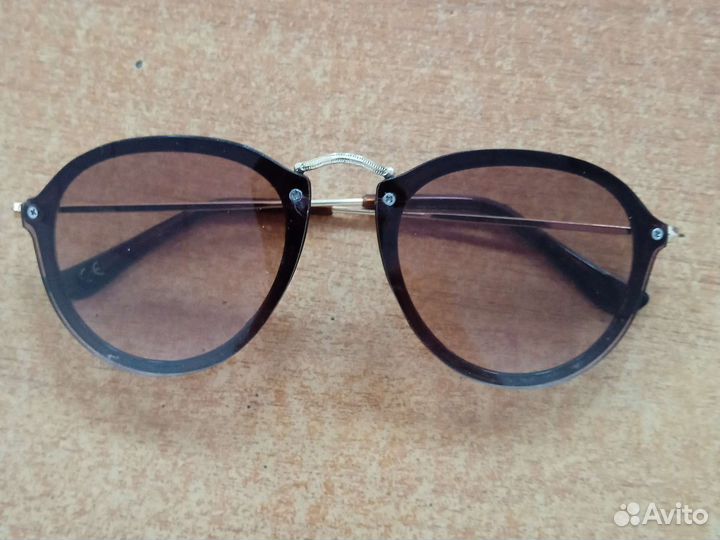 Солнцезащитные очки женские брендовые