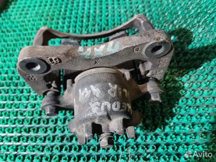 Суппорт тормозной передний левый Mitsubishi Lancer