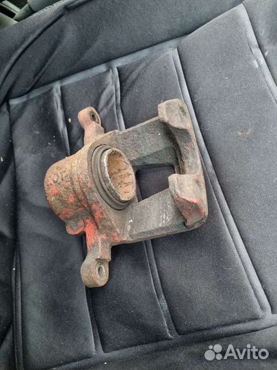 Lanos суппорт передний левый