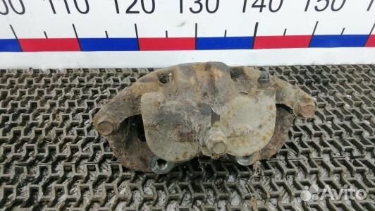 Суппорт тормозной передний левый nissan navara D22