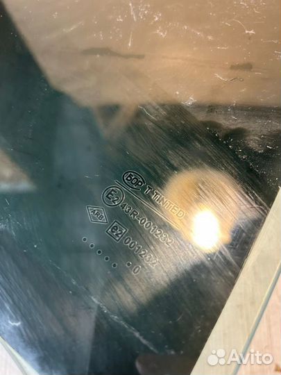 Стекло заднее правое Renault Logan K7M710