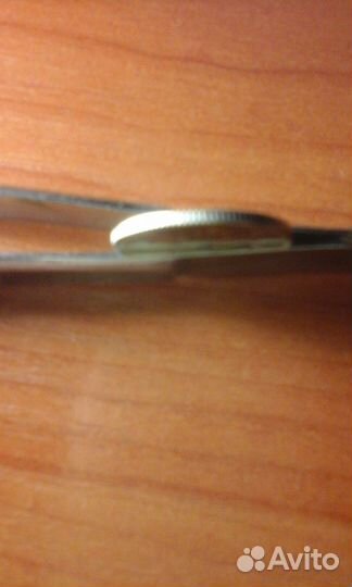 1 рубль 2014 года с перечеркнутой буквой Р