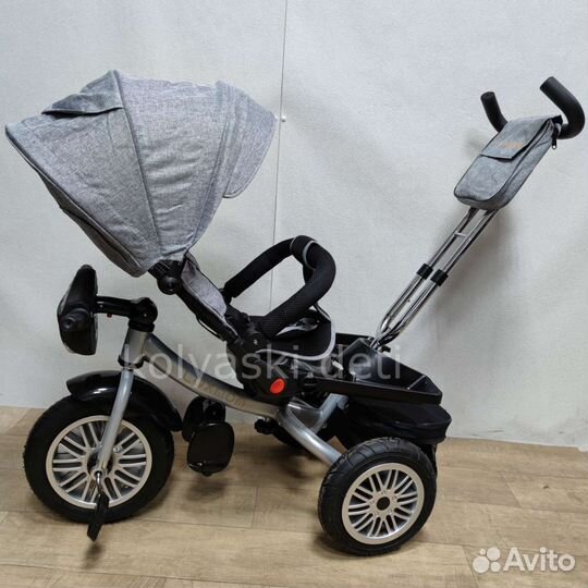 Трехколесный велосипед-коляска BMW