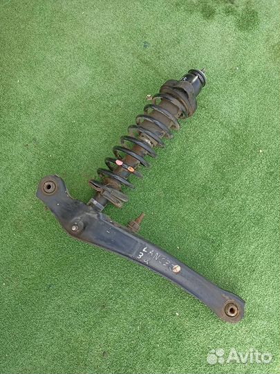 Стойка в сборе задняя Mitsubishi Lancer 9