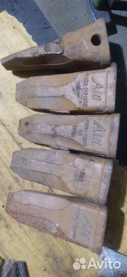 Зубья на ковш хундай