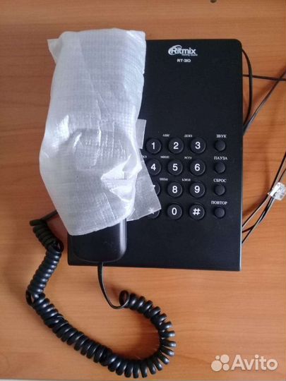 Проводной телефон