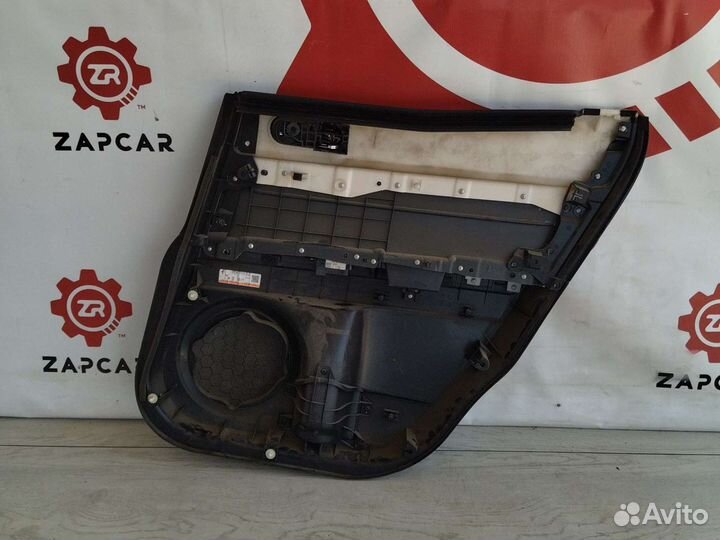 Обшивка задней левой двери Mazda CX7