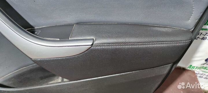 Обшивка двери передней правой Opel Astra j