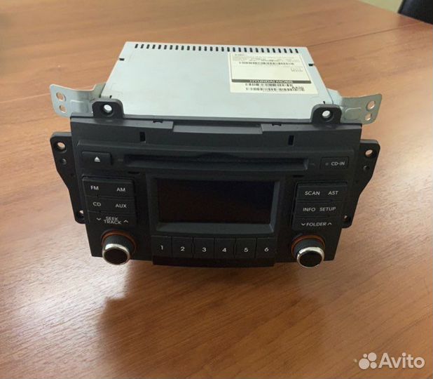 Штатная магнитола и рамка на KIA Cerato II