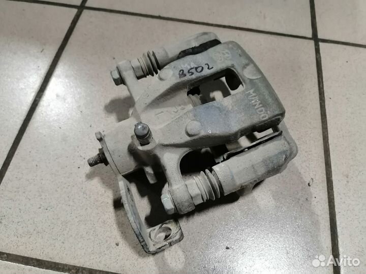 Суппорт тормозной задний левый Солярис 2011