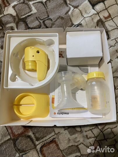 Молокоотсос электрический medela