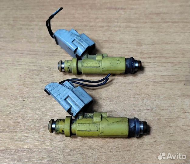 Форсунка топливная Toyota Corolla E110 23250-11130