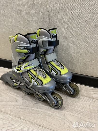 Роликовые коньки