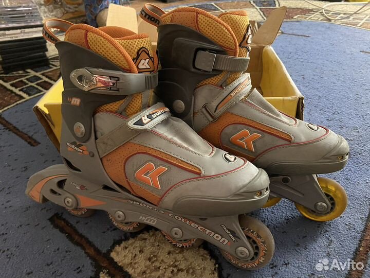 Роликовые коньки