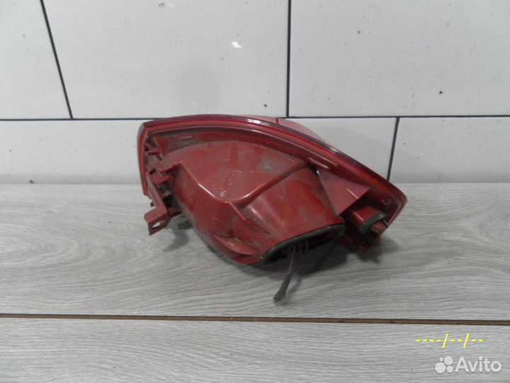 Фонарь задний левый VW Passat B6 универсал