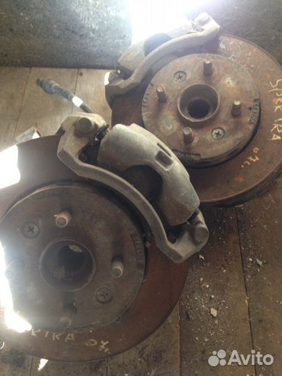 Киа спектра Поворотный Кулак,супорт,тормозной диск