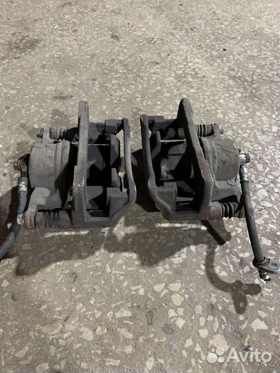 Суппорт передний левый правый honda civic 4d