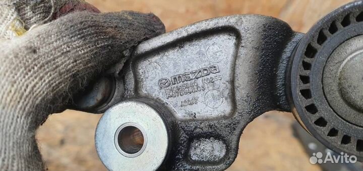 Ролик-натяжитель ручейкового ремня Mazda CX 5 KE