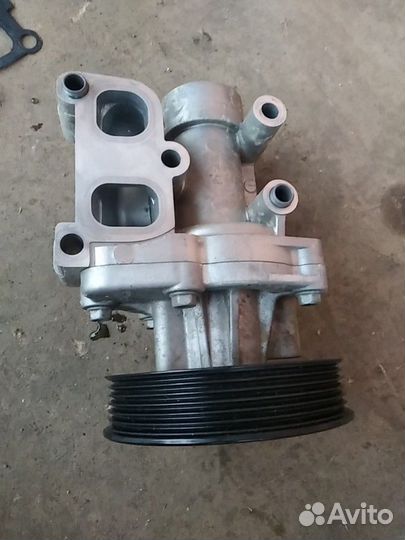 Помпа KIA Sportage 3