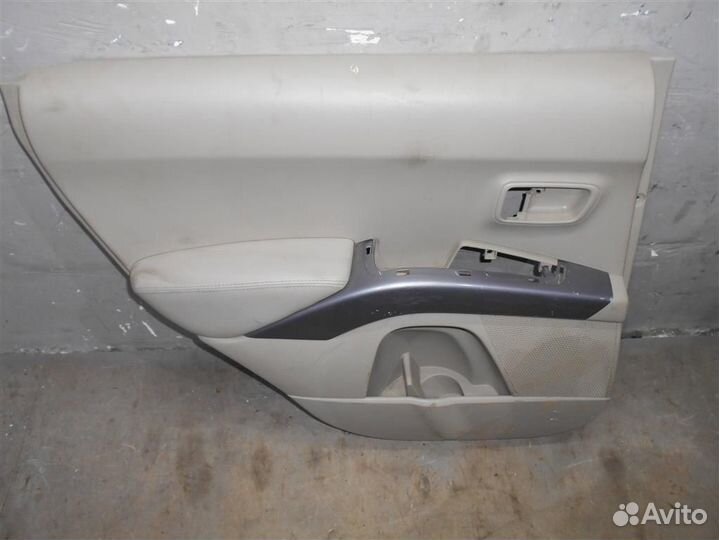 Обшивка двери задней левой от Mitsubishi Outlande