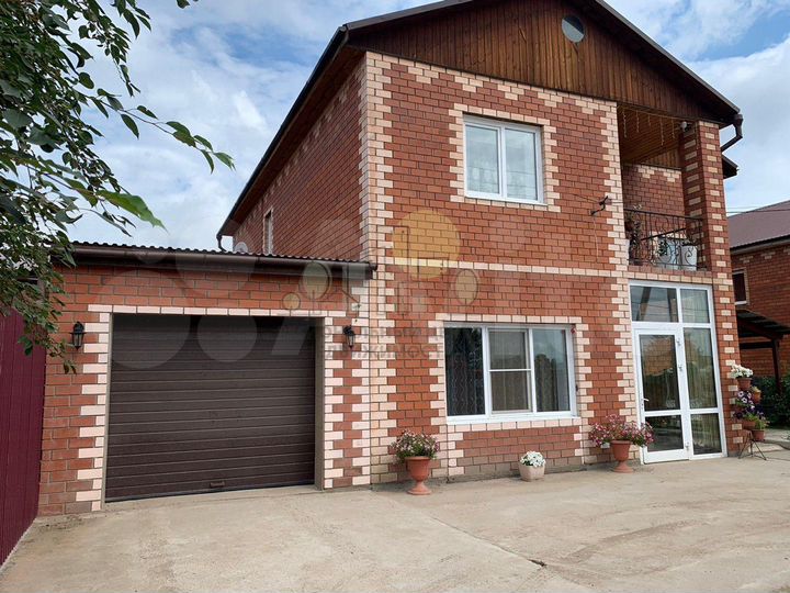 Коттедж 258 м² на участке 9 сот.