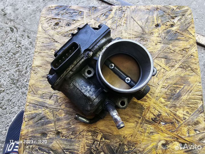 Дроссельная заслонка Лансер 10