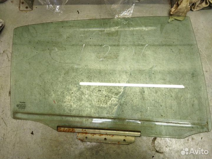 Стекло двери заднее правое Toyota Corolla E12
