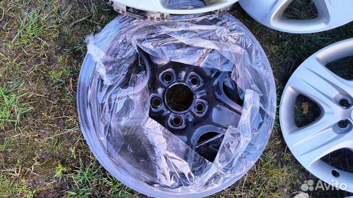 Диски Opel r16 с колпаками и резиной