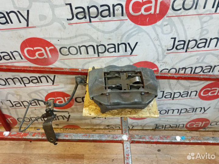 Суппорт тормозной передний правый Toyota Land