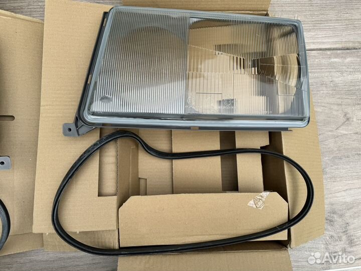 Стекла фар w124 новые hella дорест