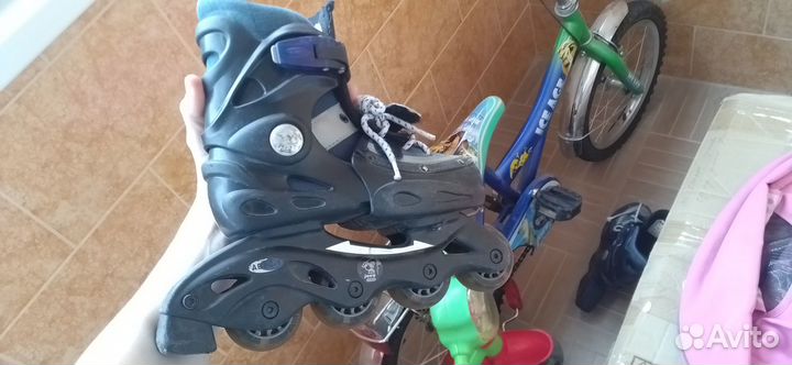 Роликовые коньки